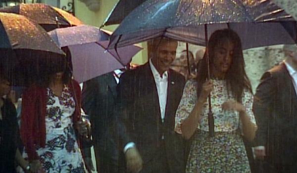  rain, deserted streets police greet barack obama in havana