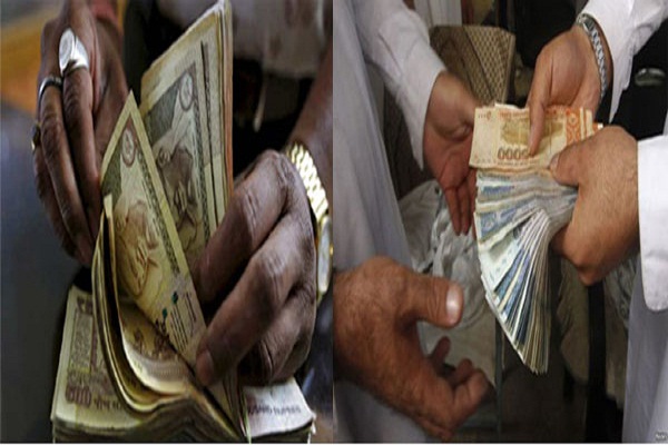 pakistani dealers exchange currency at a money